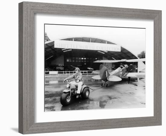 A Honda All Terrain Cycle Pulling a Vintage Biplane, 1982-null-Framed Photographic Print