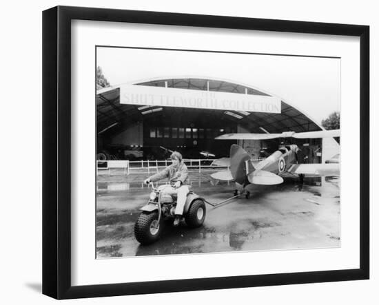 A Honda All Terrain Cycle Pulling a Vintage Biplane, 1982-null-Framed Photographic Print