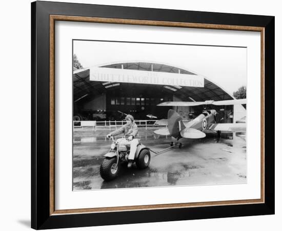 A Honda All Terrain Cycle Pulling a Vintage Biplane, 1982-null-Framed Photographic Print