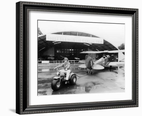 A Honda All Terrain Cycle Pulling a Vintage Biplane, 1982-null-Framed Photographic Print