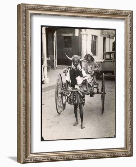 A Horned Rickshaw Man in Bulawayo, Southern Rhodesia (Now Zimbabwe)-null-Framed Photographic Print