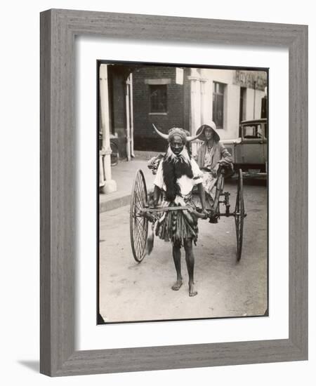 A Horned Rickshaw Man in Bulawayo, Southern Rhodesia (Now Zimbabwe)-null-Framed Photographic Print