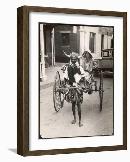 A Horned Rickshaw Man in Bulawayo, Southern Rhodesia (Now Zimbabwe)-null-Framed Photographic Print