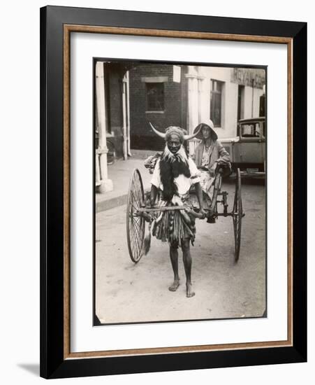 A Horned Rickshaw Man in Bulawayo, Southern Rhodesia (Now Zimbabwe)-null-Framed Photographic Print