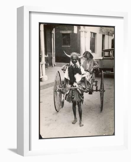 A Horned Rickshaw Man in Bulawayo, Southern Rhodesia (Now Zimbabwe)-null-Framed Photographic Print