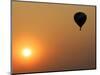 A Hot-Air Balloon Flies Over the Peremilovo Village-null-Mounted Photographic Print