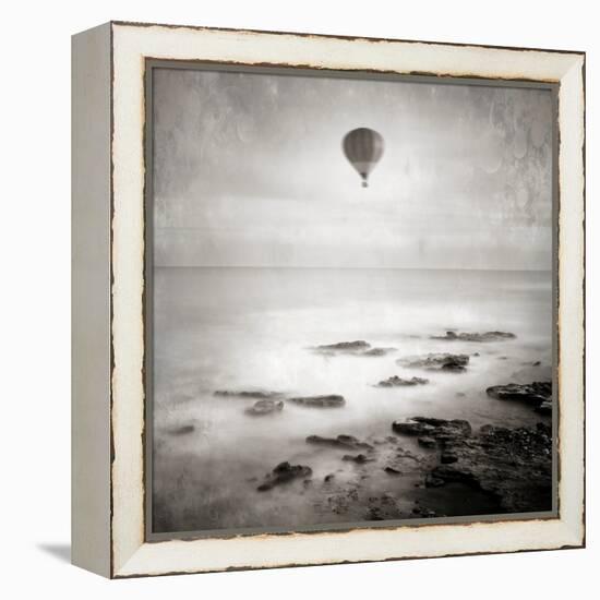 A Hot Air Balloon Floating Above the Sea-Luis Beltran-Framed Premier Image Canvas