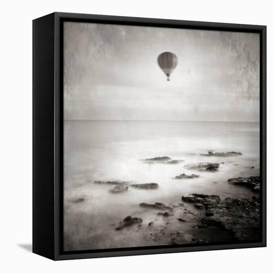 A Hot Air Balloon Floating Above the Sea-Luis Beltran-Framed Premier Image Canvas