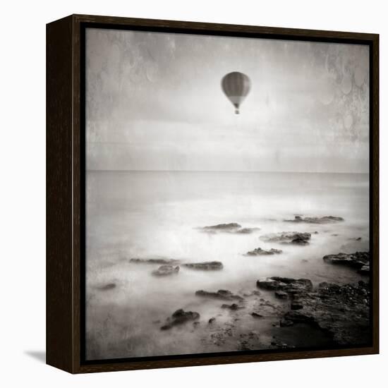 A Hot Air Balloon Floating Above the Sea-Luis Beltran-Framed Premier Image Canvas