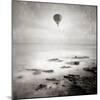 A Hot Air Balloon Floating Above the Sea-Luis Beltran-Mounted Photographic Print