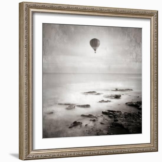 A Hot Air Balloon Floating Above the Sea-Trigger Image-Framed Photographic Print