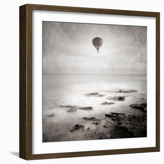 A Hot Air Balloon Floating Above the Sea-Trigger Image-Framed Photographic Print