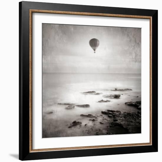 A Hot Air Balloon Floating Above the Sea-Trigger Image-Framed Photographic Print