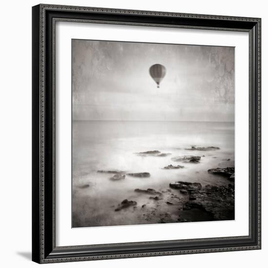 A Hot Air Balloon Floating Above the Sea-Trigger Image-Framed Photographic Print