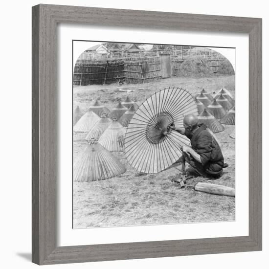 A Japanese Umbrella Maker, Kobe, Japan, 1896-Underwood & Underwood-Framed Photographic Print