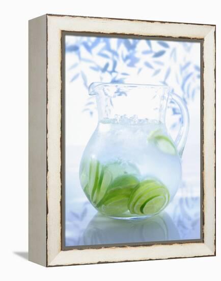 A Jug of Water with Limes-Axel Weiss-Framed Premier Image Canvas