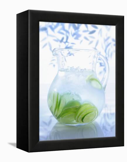 A Jug of Water with Limes-Axel Weiss-Framed Premier Image Canvas