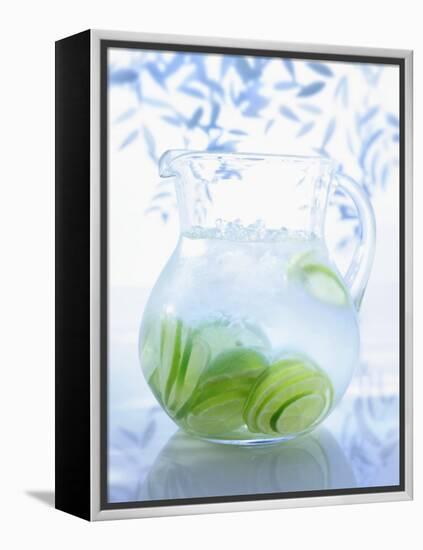 A Jug of Water with Limes-Axel Weiss-Framed Premier Image Canvas