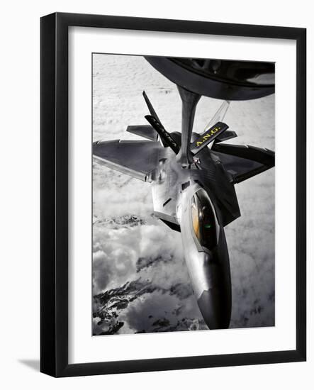 A KC-135 Stratotanker Refuels a F-22 Raptor-Stocktrek Images-Framed Photographic Print