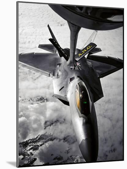 A KC-135 Stratotanker Refuels a F-22 Raptor-Stocktrek Images-Mounted Photographic Print