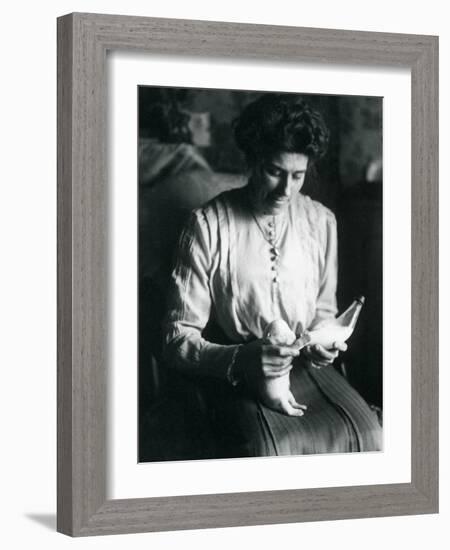 A Keeper's Wife Bottle-Feeds a Newborn Polar Bear Cub, London Zoo, C.1914-Frederick William Bond-Framed Photographic Print