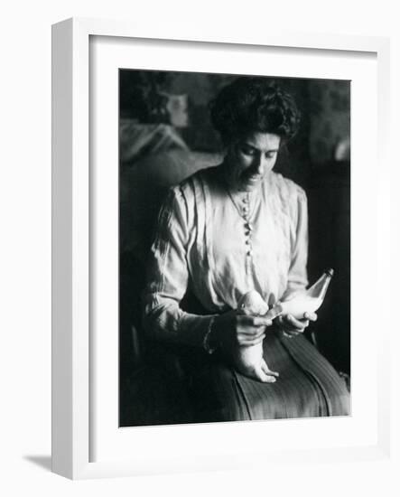 A Keeper's Wife Bottle-Feeds a Newborn Polar Bear Cub, London Zoo, C.1914-Frederick William Bond-Framed Photographic Print