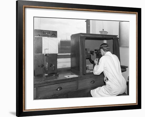 A Lab Tachnician with a Reichter Microscope at a Steelworks, Sheffield, South Yorkshire, 1962-Michael Walters-Framed Photographic Print