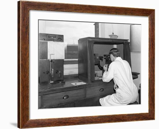 A Lab Tachnician with a Reichter Microscope at a Steelworks, Sheffield, South Yorkshire, 1962-Michael Walters-Framed Photographic Print
