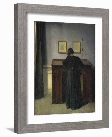 A Lady Writing at Her Desk-Vilhelm Hammershoi-Framed Giclee Print