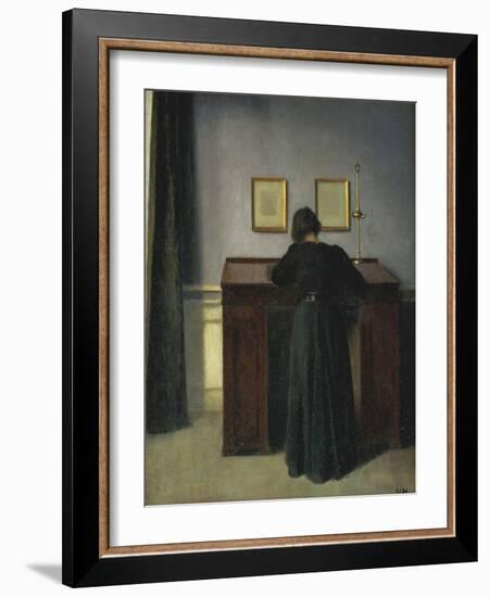 A Lady Writing at Her Desk-Vilhelm Hammershoi-Framed Giclee Print