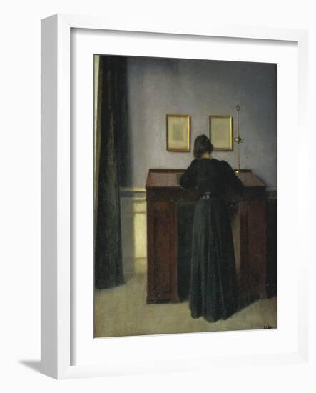 A Lady Writing at Her Desk-Vilhelm Hammershoi-Framed Giclee Print