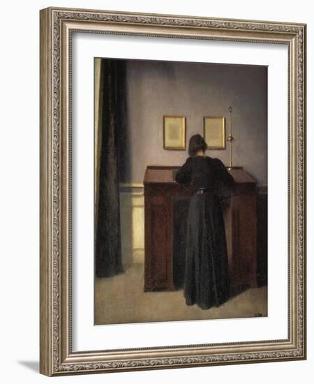 A Lady Writing at Her Desk-Vilhelm Hammershoi-Framed Giclee Print