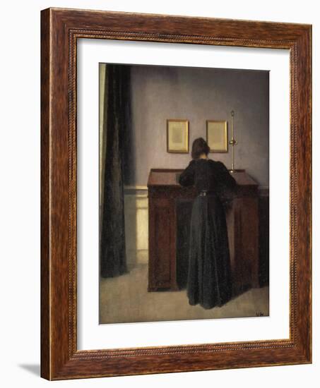 A Lady Writing at Her Desk-Vilhelm Hammershoi-Framed Giclee Print