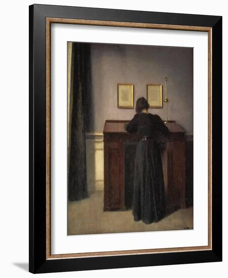 A Lady Writing at Her Desk-Vilhelm Hammershoi-Framed Giclee Print