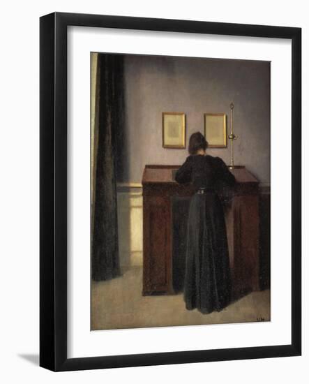 A Lady Writing at Her Desk-Vilhelm Hammershoi-Framed Giclee Print