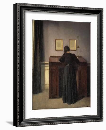 A Lady Writing at Her Desk-Vilhelm Hammershoi-Framed Giclee Print