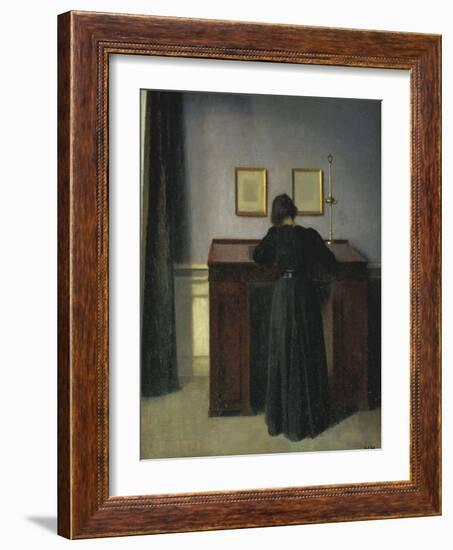 A Lady Writing at Her Desk-Vilhelm Hammershoi-Framed Giclee Print