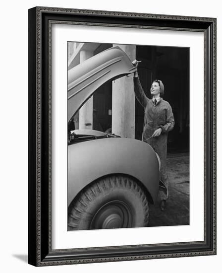 A Land Girl Mechanic Working on a Car During World War Ii-Robert Hunt-Framed Photographic Print