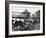 A Land Girl Working Feeding Cattle on a Farm During World War Ii-Robert Hunt-Framed Photographic Print