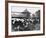 A Land Girl Working Feeding Cattle on a Farm During World War Ii-Robert Hunt-Framed Photographic Print