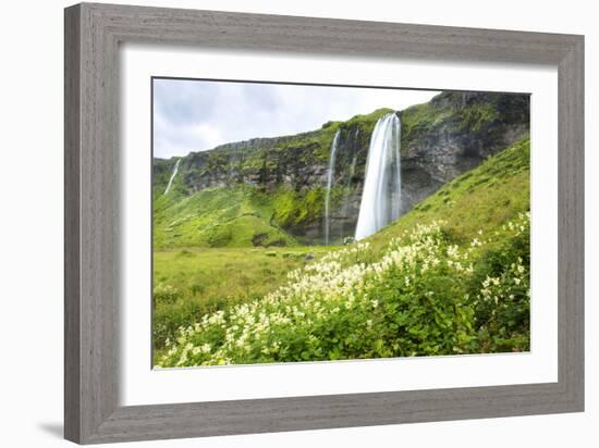 A Large Waterfalls Plunges Over A Cliff In Iceland-Erik Kruthoff-Framed Photographic Print