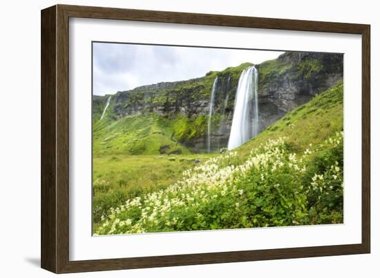 A Large Waterfalls Plunges Over A Cliff In Iceland-Erik Kruthoff-Framed Photographic Print