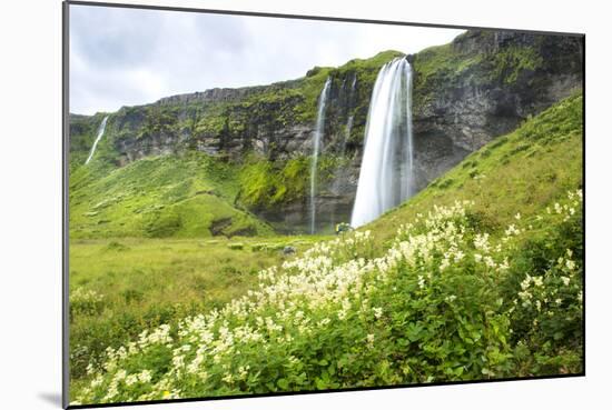 A Large Waterfalls Plunges Over A Cliff In Iceland-Erik Kruthoff-Mounted Photographic Print