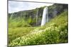 A Large Waterfalls Plunges Over A Cliff In Iceland-Erik Kruthoff-Mounted Photographic Print