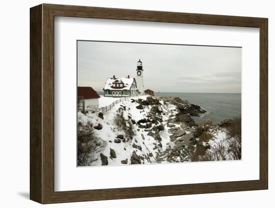 A Large Wreath is Hung on Portland Head Lighthouse in Maine to Celebrate the Holiday Season. Portla-Allan Wood Photography-Framed Photographic Print