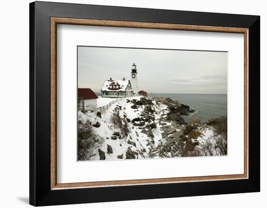 A Large Wreath is Hung on Portland Head Lighthouse in Maine to Celebrate the Holiday Season. Portla-Allan Wood Photography-Framed Photographic Print