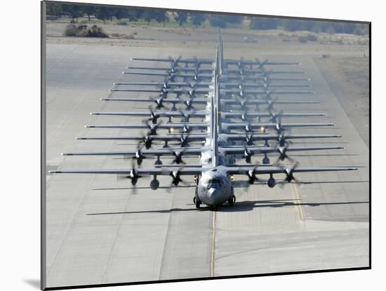 A Line of C-130 Hercules Taxi at Nellis Air Force Base, Nevada-Stocktrek Images-Mounted Photographic Print