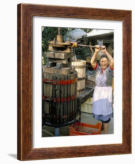 A Local Winemaker Pressing Her Grapes at the Cantina, Torano Nuovo, Abruzzi, Italy-Michael Newton-Framed Photographic Print