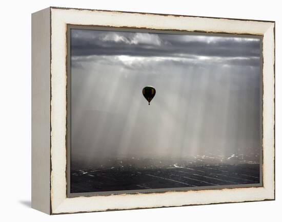 A Lone Balloon Drifts Near the Foothills of Albuquerque, N.M.-null-Framed Premier Image Canvas