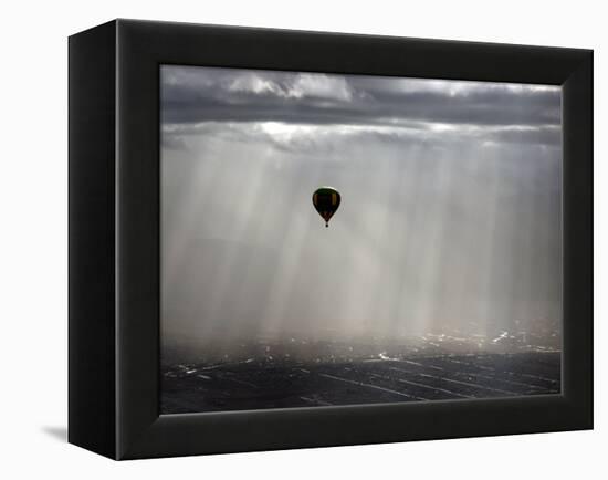 A Lone Balloon Drifts Near the Foothills of Albuquerque, N.M.-null-Framed Premier Image Canvas